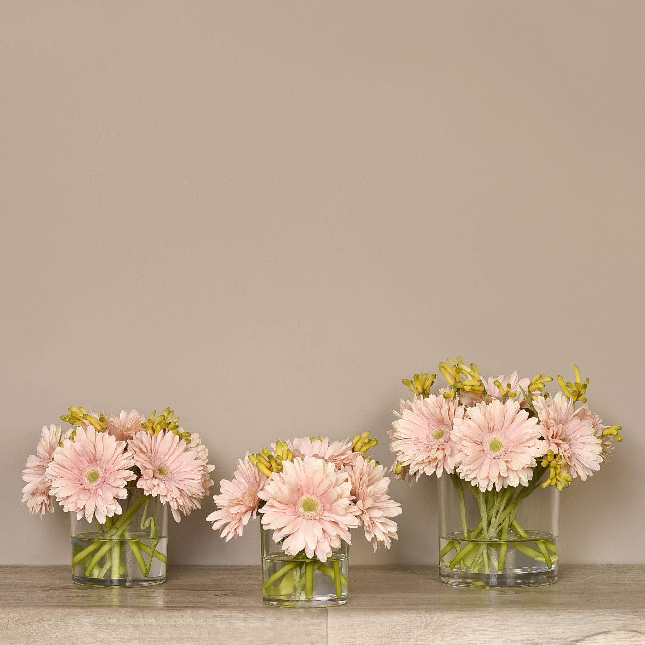 Artificial Gerbera Arrangement in Glass Vase - Image 5