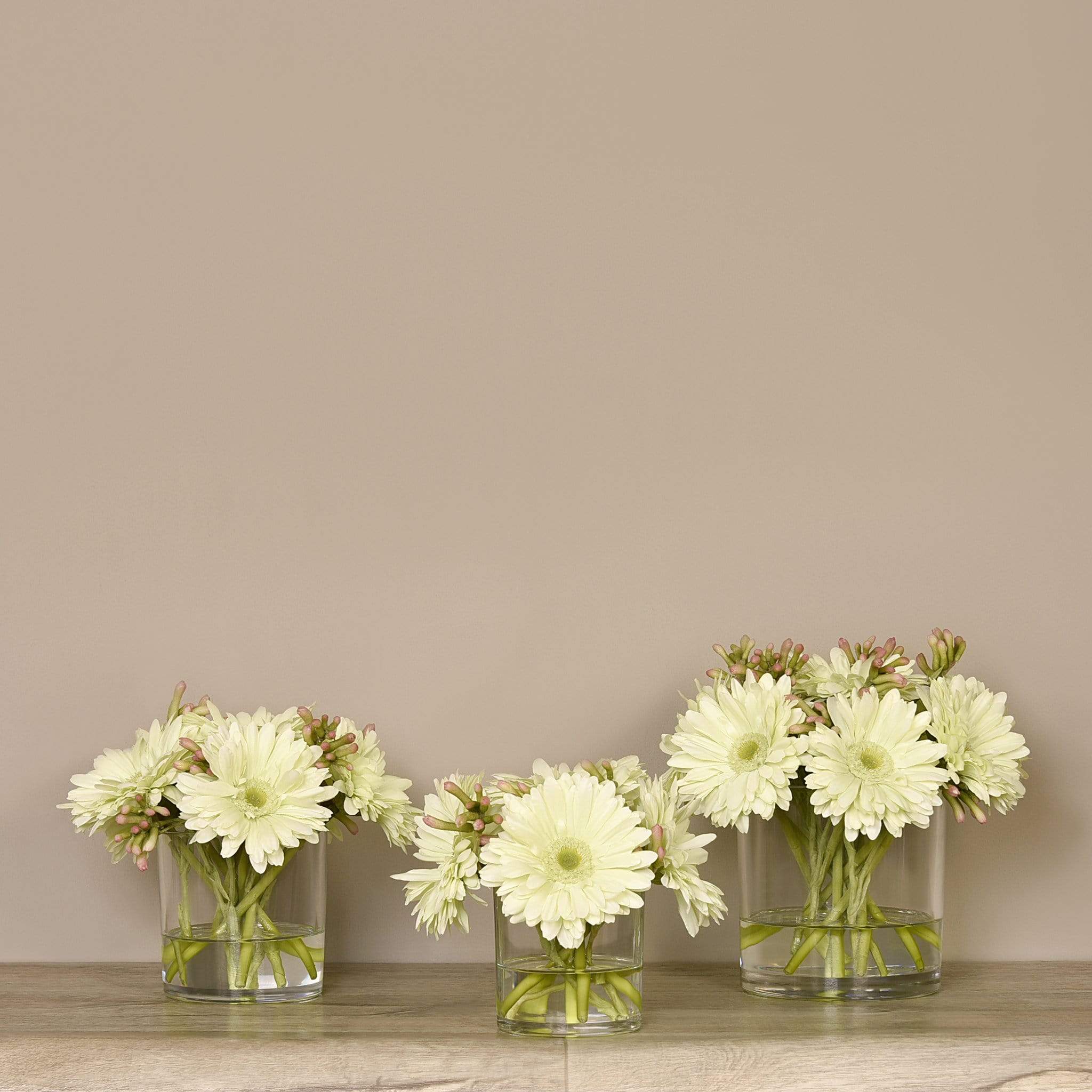 Artificial Gerbera Arrangement in Glass Vase - Image 9