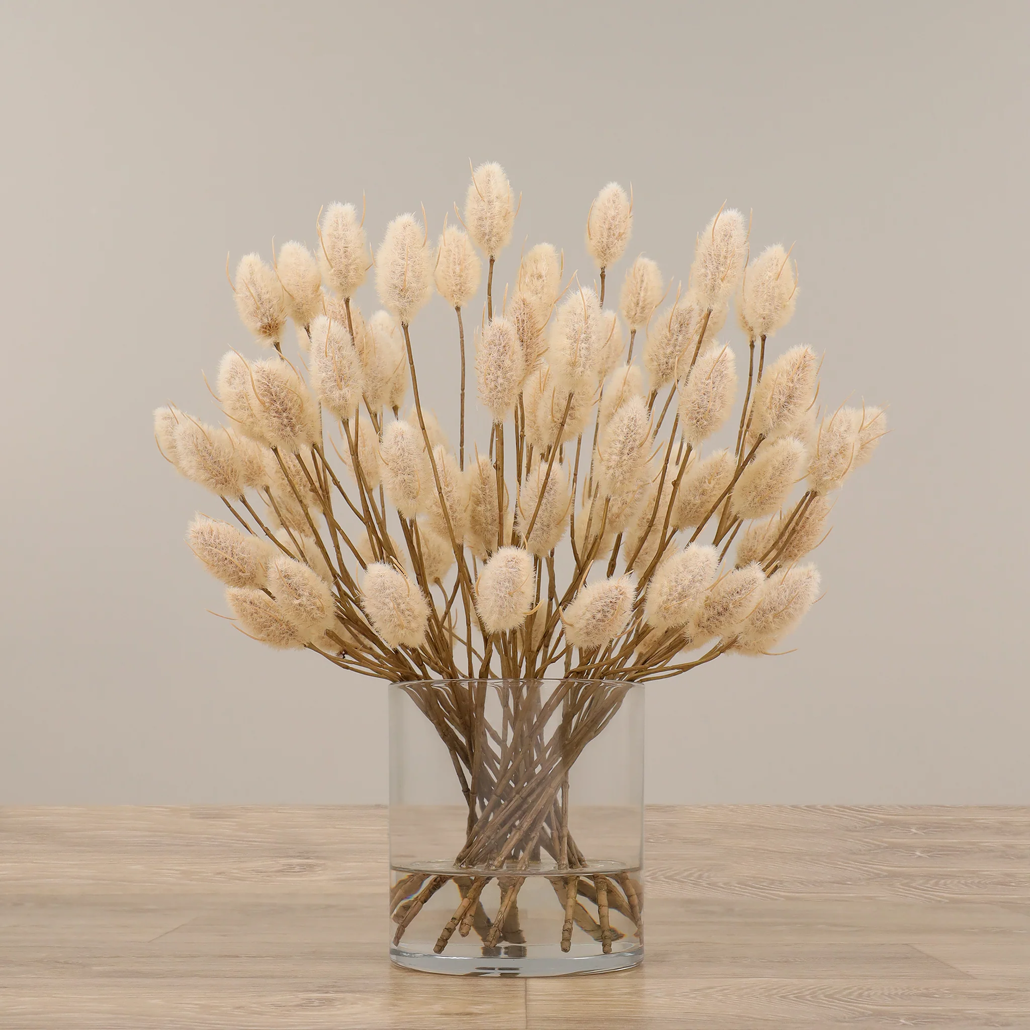 Artificial Hare Tail Arrangement in Glass Vase - Image 9