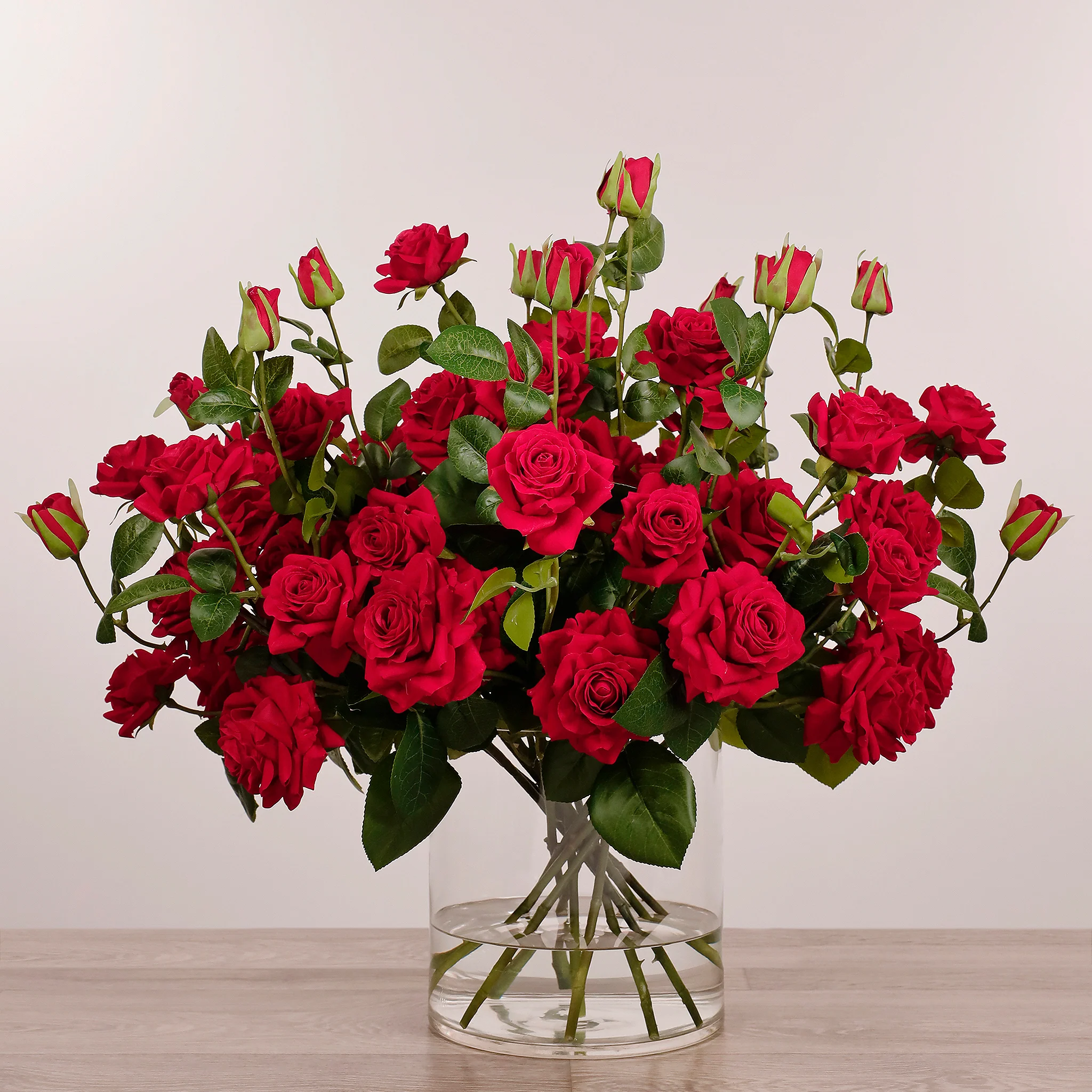 Artificial Rose Arrangement in Glass Vase - Image 3
