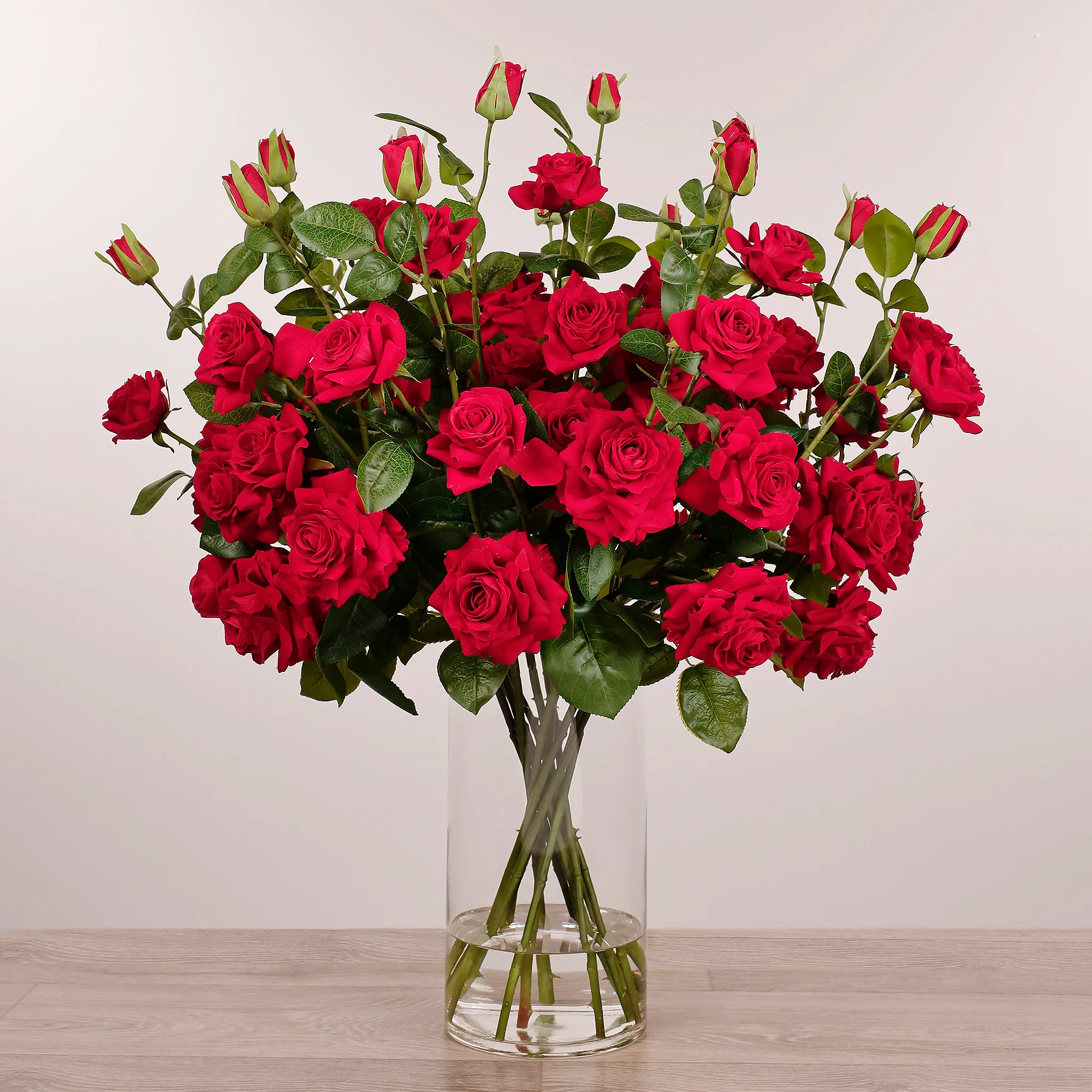 Artificial Rose Arrangement in Glass Vase - Image 3